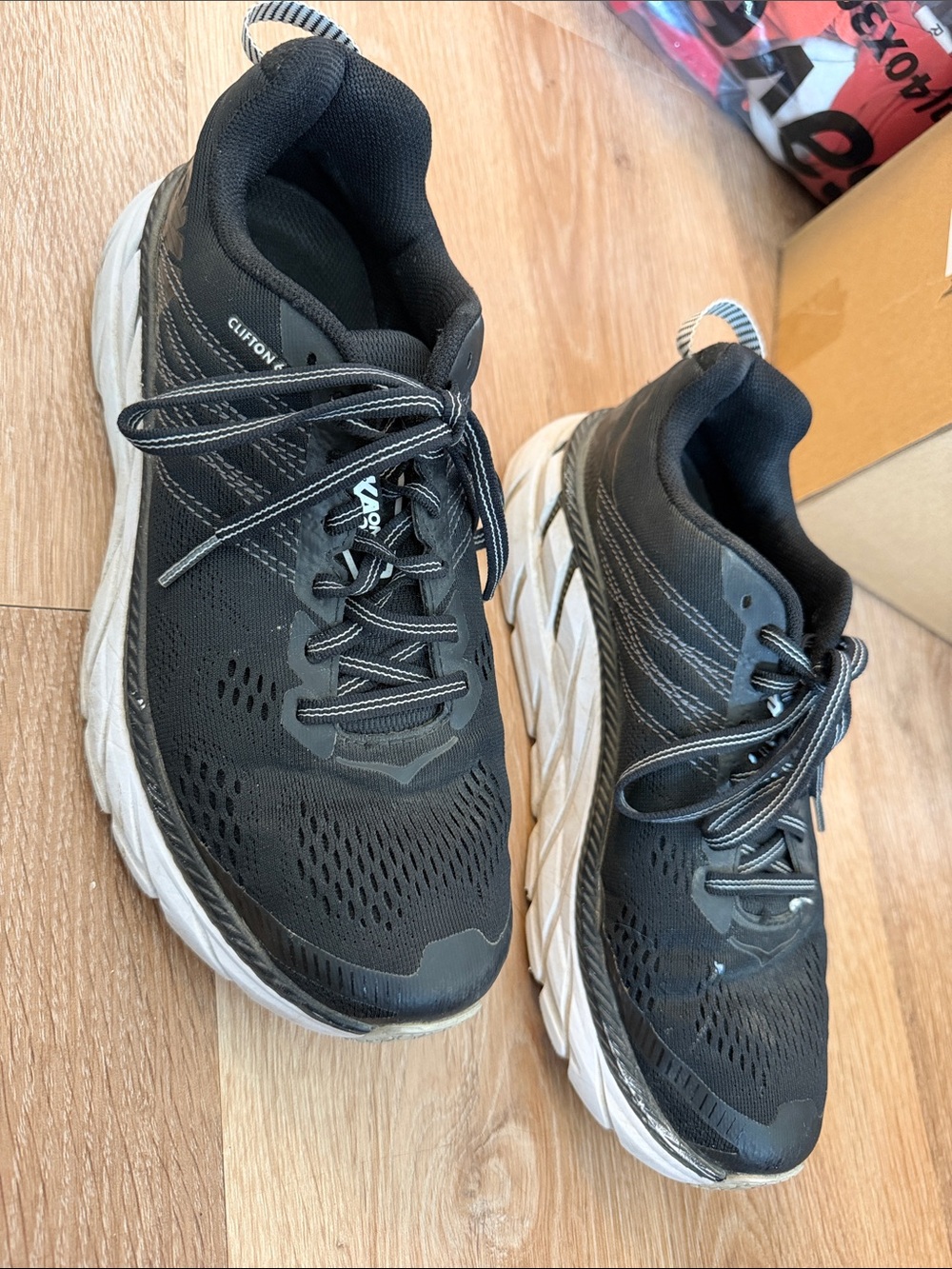 Hoka Black and White Clifton Running Shoes